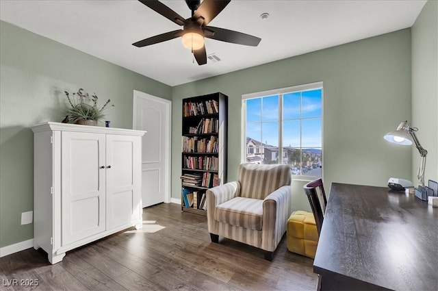 9916 Fallowdeer Ct, Las Vegas, NV 89149 - living area featuring a ceiling fan and dark wood-style floors