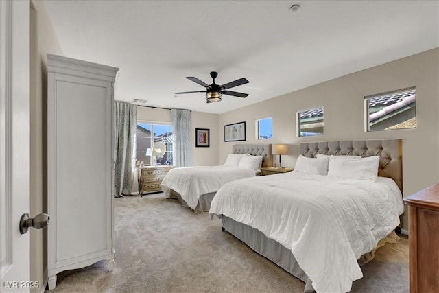 9916 Fallowdeer Ct, Las Vegas, NV 89149 - bedroom featuring light colored carpet and ceiling fan