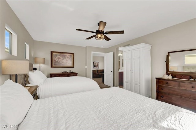 9916 Fallowdeer Ct, Las Vegas, NV 89149 - bedroom with connected bathroom and ceiling fan