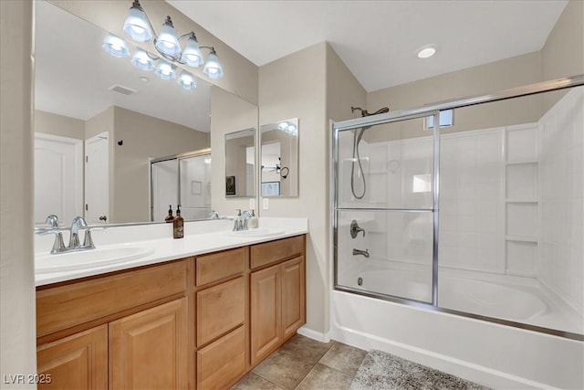 9916 Fallowdeer Ct, Las Vegas, NV 89149 - bathroom with double vanity, bath / shower combo with glass door, and tile patterned floors