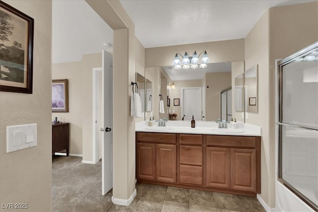 9916 Fallowdeer Ct, Las Vegas, NV 89149 - full bathroom featuring double vanity and baseboards