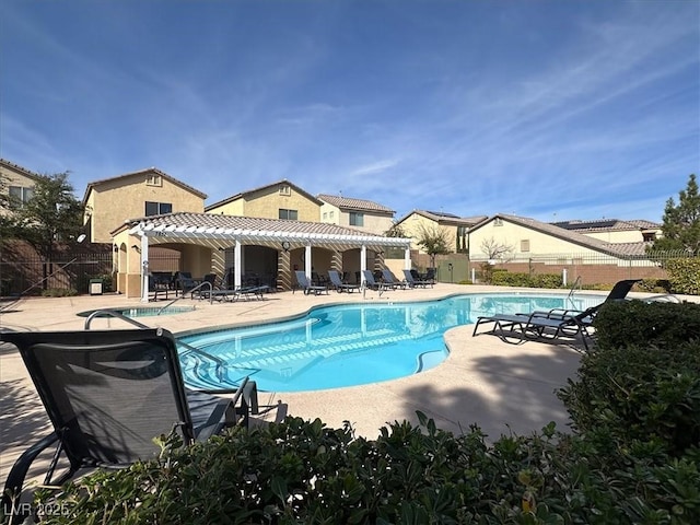 9916 Fallowdeer Ct, Las Vegas, NV 89149 - community pool with a pergola and a patio area