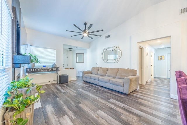 7824 Indian Cloud Ave, Las Vegas, NV 89129 - living room featuring wood finished floors, a ceiling fan, and healthy amount of natural light