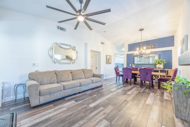 7824 Indian Cloud Ave, Las Vegas, NV 89129 - living area featuring a chandelier, wood finished floors, a ceiling fan, and lofted ceiling