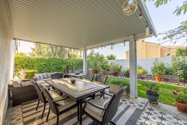 7824 Indian Cloud Ave, Las Vegas, NV 89129 - fenced backyard with outdoor dining space and a patio