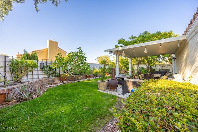 7824 Indian Cloud Ave, Las Vegas, NV 89129 - fenced backyard with an outdoor living space and a patio area