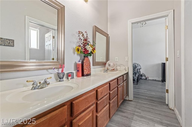 60 N Fogg St, Las Vegas, NV 89110 - full bath featuring double vanity and wood finished floors