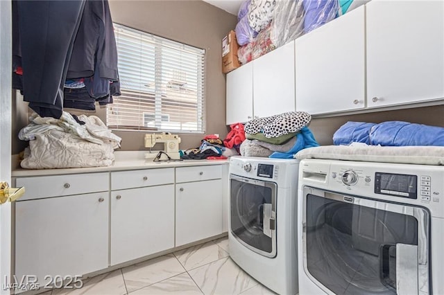 60 N Fogg St, Las Vegas, NV 89110 - laundry area with separate washer and dryer, cabinet space, and light marble finish floors