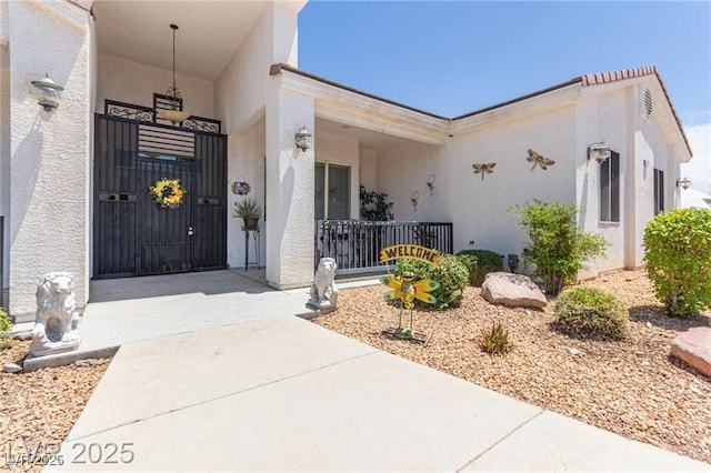60 N Fogg St, Las Vegas, NV 89110 - view of exterior entry with stucco siding