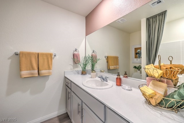 1321 Gable Falls Dr Unit 58, North Las Vegas, NV 89084 - bathroom featuring vanity and wood finished floors