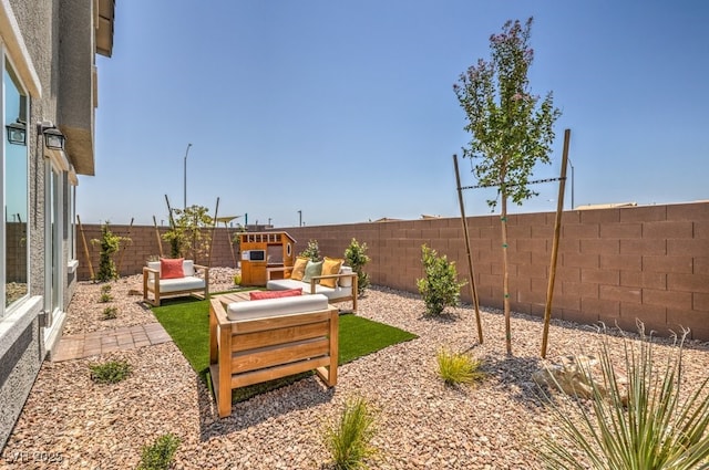 1321 Gable Falls Dr Unit 58, North Las Vegas, NV 89084 - fenced backyard featuring an outdoor hangout area and a patio