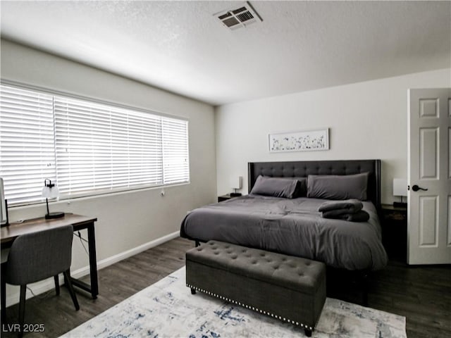 5042 S Rainbow Blvd Unit 103, Las Vegas, NV 89118 - bedroom featuring wood finished floors and a textured ceiling