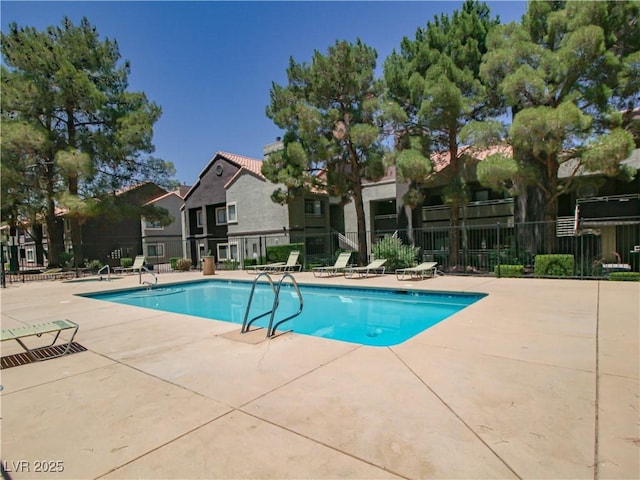 5042 S Rainbow Blvd Unit 103, Las Vegas, NV 89118 - community pool with a patio area