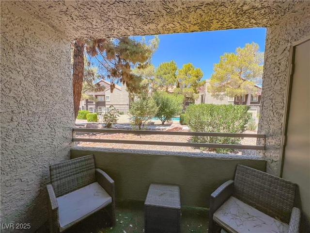 5042 S Rainbow Blvd Unit 103, Las Vegas, NV 89118 - balcony featuring a residential view