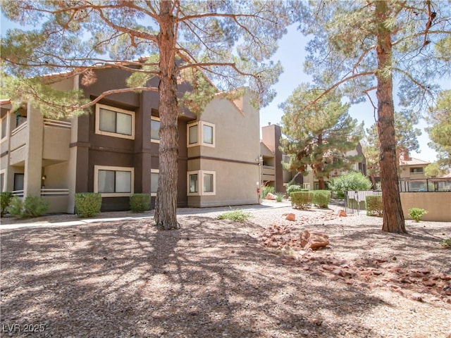 5042 S Rainbow Blvd Unit 103, Las Vegas, NV 89118 - back of property with stucco siding
