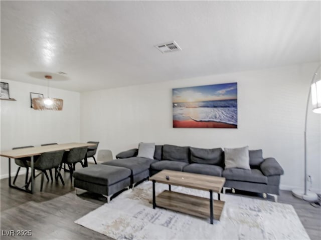 5042 S Rainbow Blvd Unit 103, Las Vegas, NV 89118 - living area featuring wood finished floors and baseboards