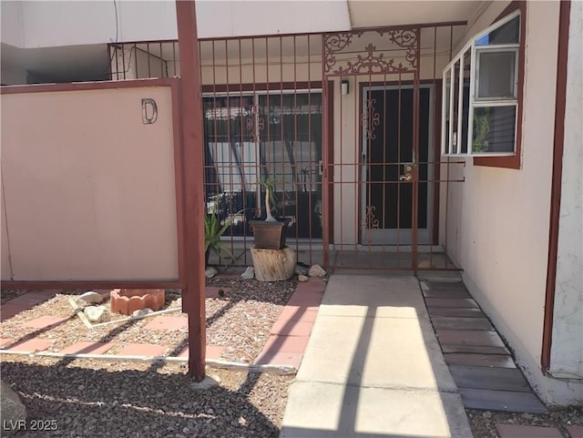425 N Lamb Blvd Unit D, Las Vegas, NV 89110 - view of exterior entry with a gate