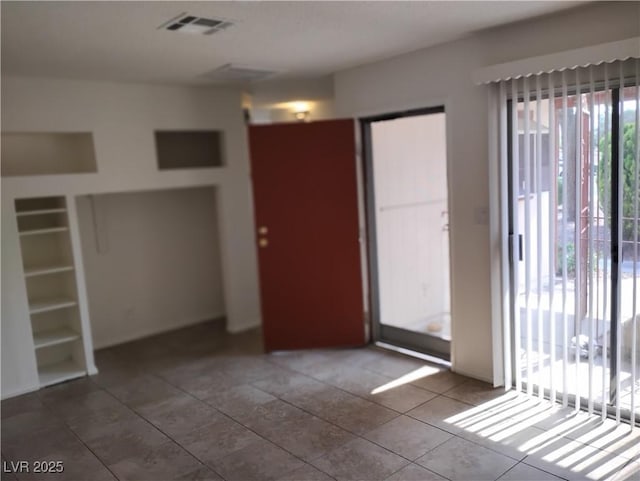 425 N Lamb Blvd Unit D, Las Vegas, NV 89110 - unfurnished room with tile patterned flooring