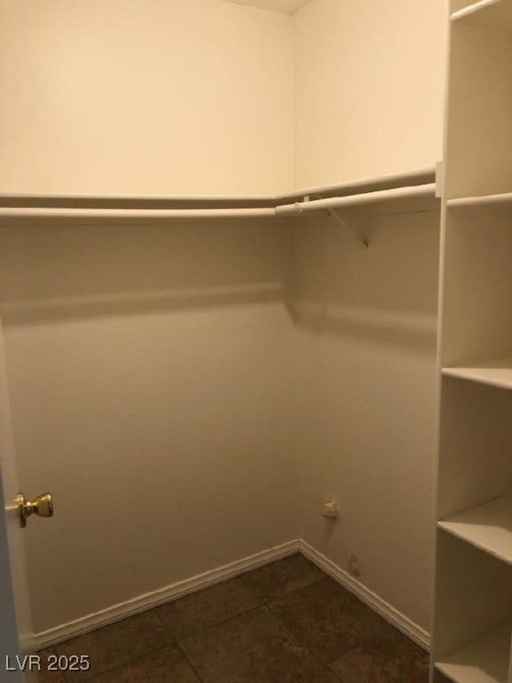 425 N Lamb Blvd Unit D, Las Vegas, NV 89110 - spacious closet with dark tile patterned floors