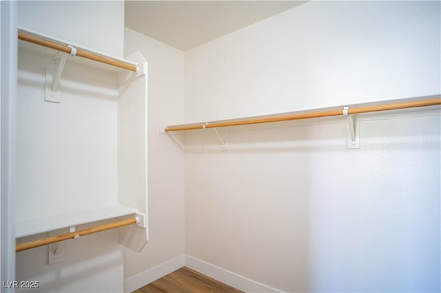 9580 W Reno Ave Unit 240, Las Vegas, NV 89148 - walk in closet featuring wood finished floors