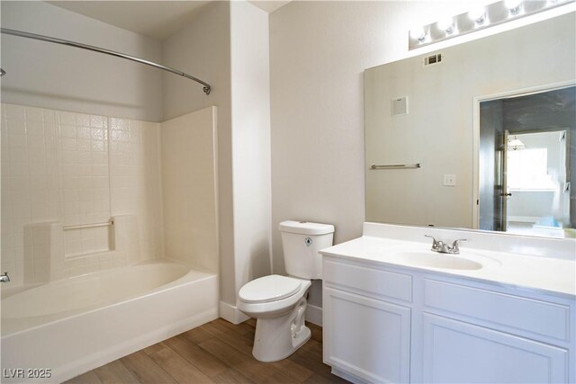 9580 W Reno Ave Unit 240, Las Vegas, NV 89148 - bathroom featuring wood finished floors, vanity, and shower / bathtub combination