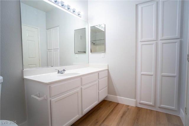 9580 W Reno Ave Unit 240, Las Vegas, NV 89148 - bathroom featuring wood finished floors and vanity