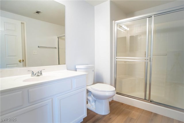 9580 W Reno Ave Unit 240, Las Vegas, NV 89148 - full bathroom with a shower with door, vanity, and wood finished floors