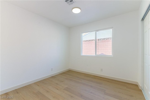 6760 Fallona Ave, Las Vegas, NV 89156 - empty room with light wood finished floors and baseboards