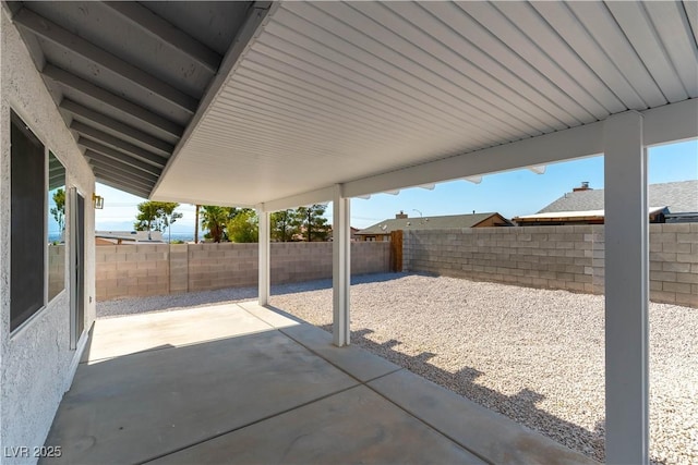 6760 Fallona Ave, Las Vegas, NV 89156 - fenced backyard with a patio