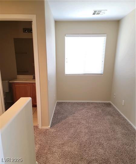 2648 Blairgowrie Dr, Henderson, NV 89044 - hall with plenty of natural light and light carpet