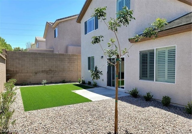 2648 Blairgowrie Dr, Henderson, NV 89044 - view of yard with a patio area