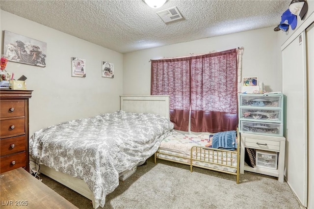 729 Concrete Ct, Las Vegas, NV 89110 - bedroom featuring carpet, a textured ceiling, and a closet