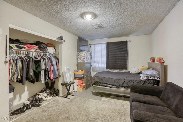 729 Concrete Ct, Las Vegas, NV 89110 - bedroom featuring carpet flooring, a closet, and a textured ceiling
