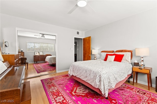 639 Lacy Ln, Las Vegas, NV 89107 - bedroom with wood finished floors, ceiling fan, and a closet