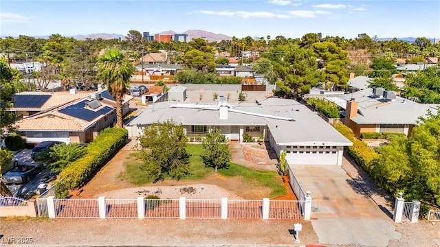 639 Lacy Ln, Las Vegas, NV 89107 - aerial view of residential area featuring a mountainous background