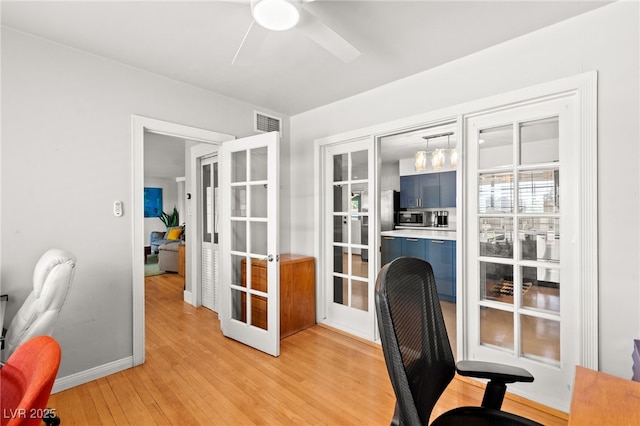 639 Lacy Ln, Las Vegas, NV 89107 - office space featuring a ceiling fan, light wood-style floors, and french doors