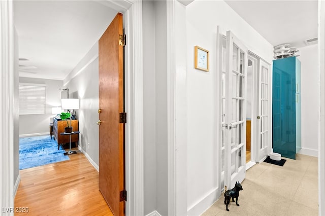 639 Lacy Ln, Las Vegas, NV 89107 - corridor with french doors and baseboards