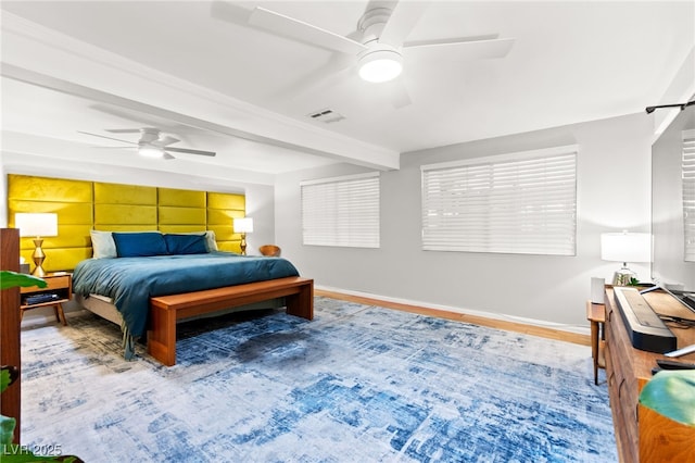 639 Lacy Ln, Las Vegas, NV 89107 - bedroom with beamed ceiling, ceiling fan, and wood finished floors