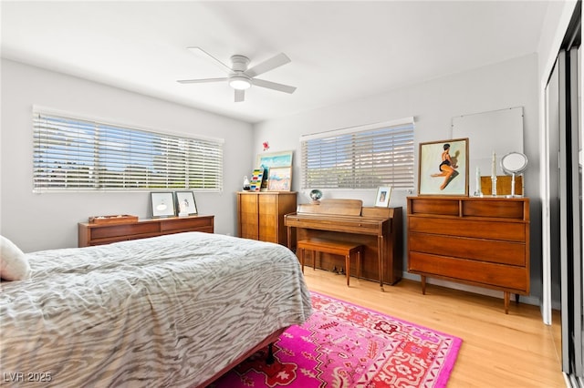 639 Lacy Ln, Las Vegas, NV 89107 - bedroom featuring multiple windows, wood finished floors, and ceiling fan