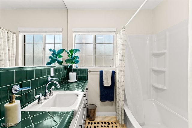 639 Lacy Ln, Las Vegas, NV 89107 - full bath featuring vanity, shower / bath combo with shower curtain, and tile patterned flooring