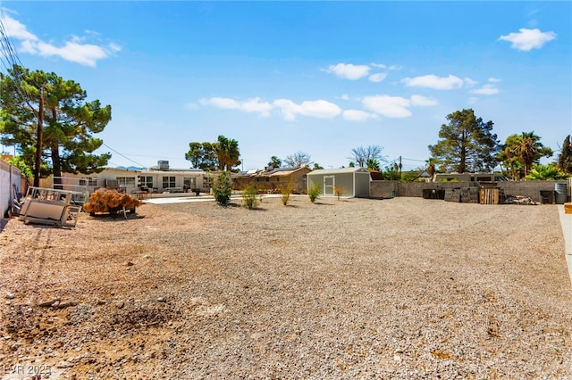 639 Lacy Ln, Las Vegas, NV 89107 - fenced backyard featuring a shed