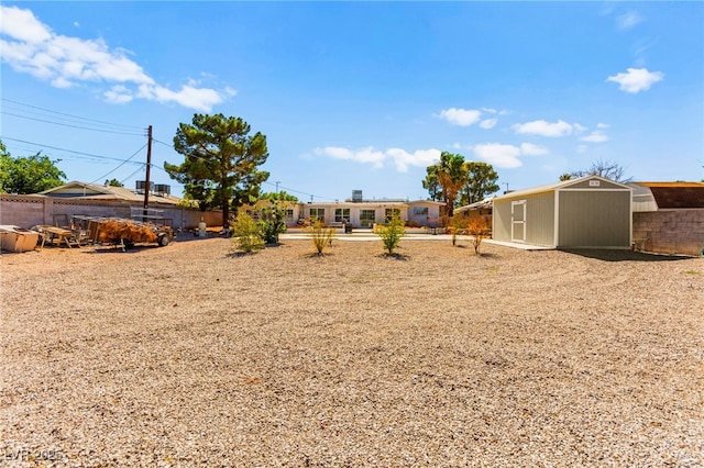 639 Lacy Ln, Las Vegas, NV 89107 - view of yard featuring a storage shed