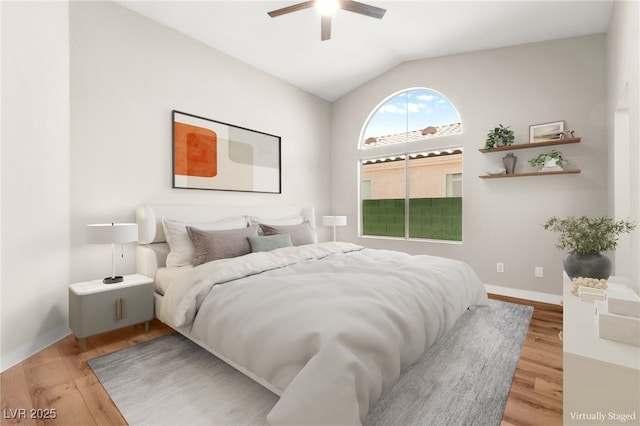 1904 Leaning Pine Way, Las Vegas, NV 89128 - bedroom with wood finished floors, lofted ceiling, and a ceiling fan