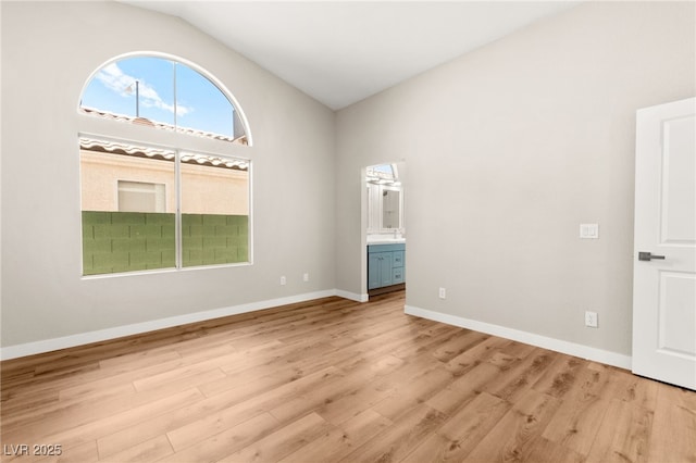 1904 Leaning Pine Way, Las Vegas, NV 89128 - empty room featuring lofted ceiling and light wood finished floors