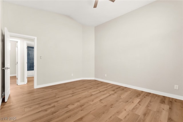 1904 Leaning Pine Way, Las Vegas, NV 89128 - spare room with ceiling fan, light wood-style floors, and vaulted ceiling