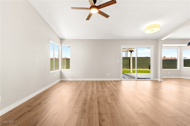 1904 Leaning Pine Way, Las Vegas, NV 89128 - empty room featuring ceiling fan, light wood-style floors, and plenty of natural light