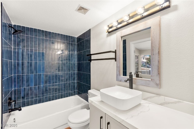 1904 Leaning Pine Way, Las Vegas, NV 89128 - full bath featuring vanity, a textured wall, and shower / bath combination