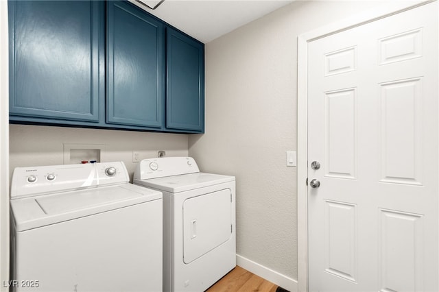 1904 Leaning Pine Way, Las Vegas, NV 89128 - laundry area featuring cabinet space, washer and clothes dryer, and light wood finished floors