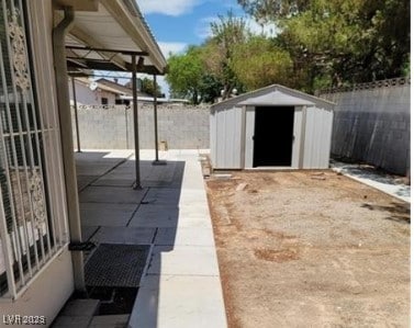 3214 Anacapa Way, Las Vegas, NV 89146 - fenced backyard featuring a shed