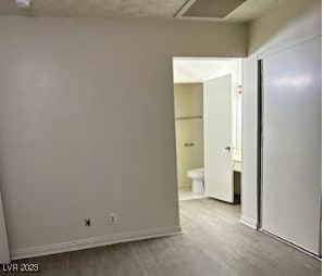 3214 Anacapa Way, Las Vegas, NV 89146 - unfurnished bedroom featuring attic access, ensuite bath, and a closet